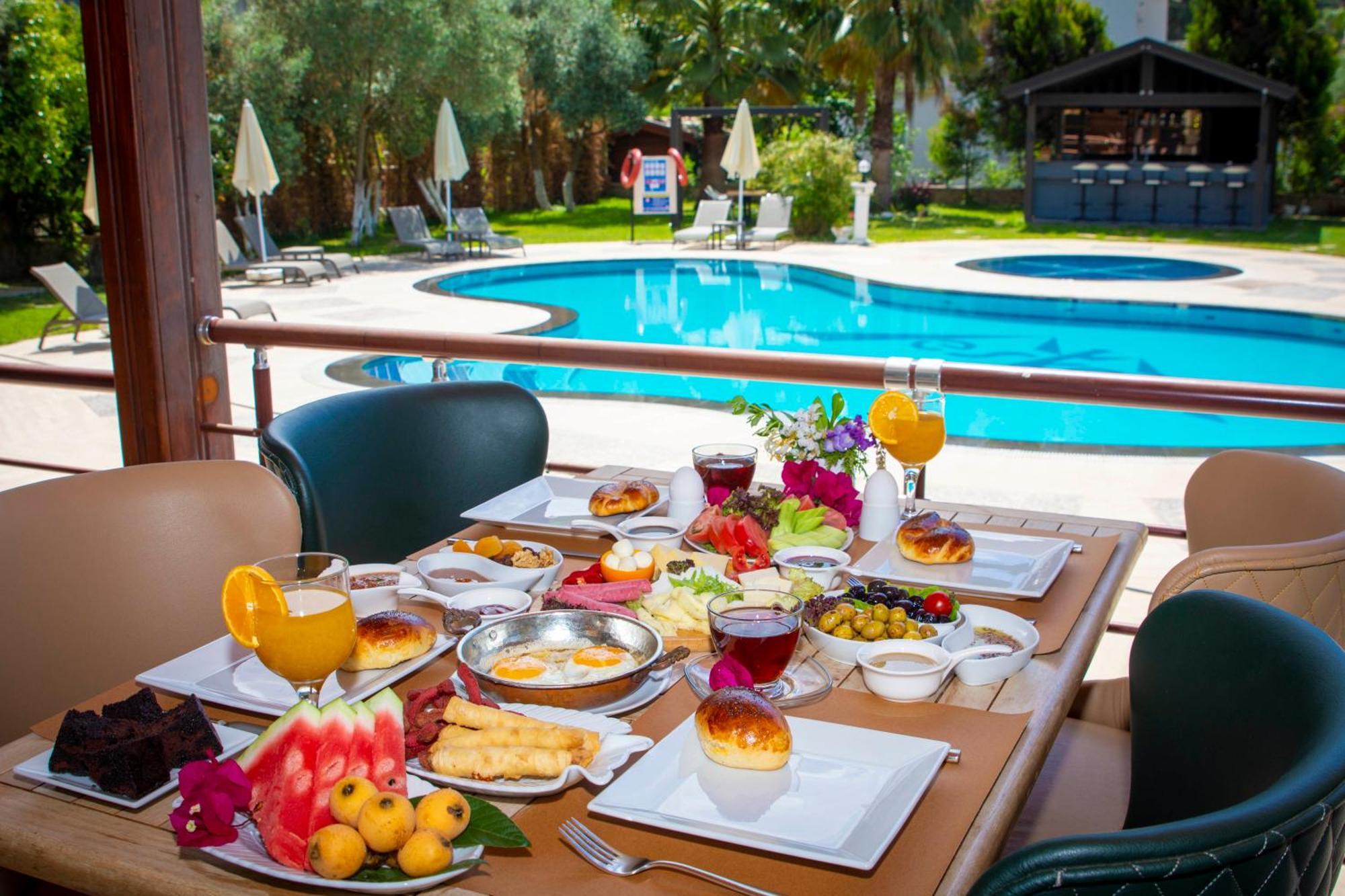 Mesken Inn Hotel Гёчек Экстерьер фото